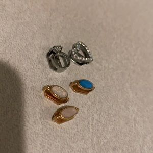Set of 5 keep collective charms.